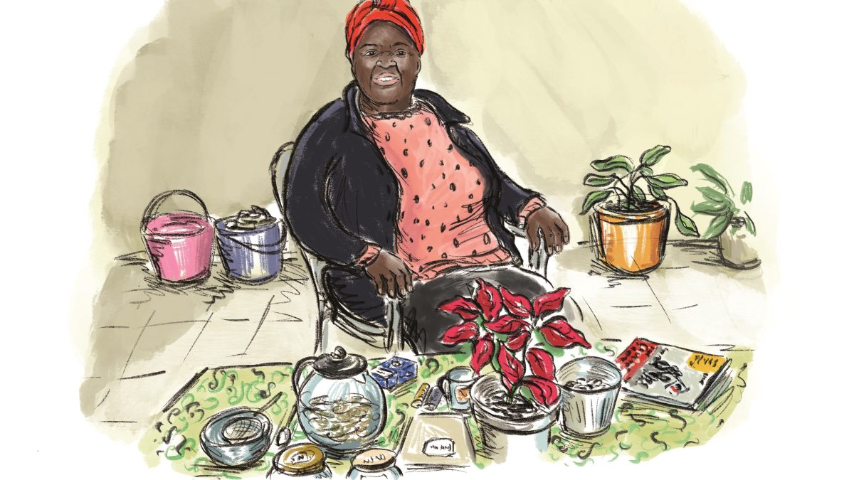 Bunte Zeichnung von einer Frau, die fröhlich guckend auf einem Stuhl sitzt. Vor ihr auf dem Tisch stehen ein paar Gegenstände.